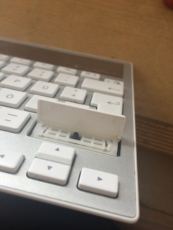The opened shift key, still hooked in at the top