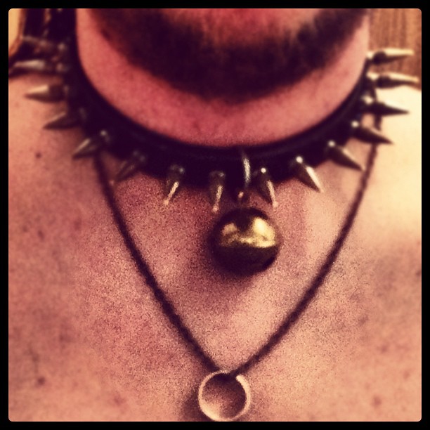 Neck with necklace and leather band